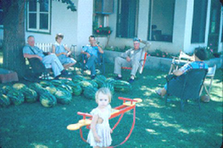 1955_00_00_CarolWithParentsAndGrandparents