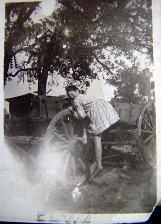 1920ish_ElwaBumgarnerOnWagon