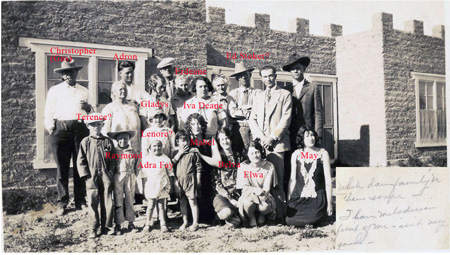 1928ish_GusBumgarnerFamilyInFrontOfHouse_000